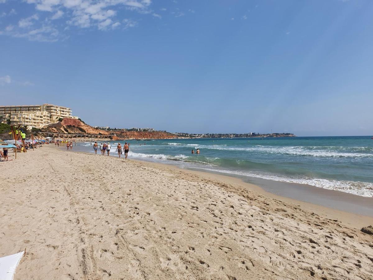 Apartment In Campoamor Overlooking The Swimming Pool מראה חיצוני תמונה