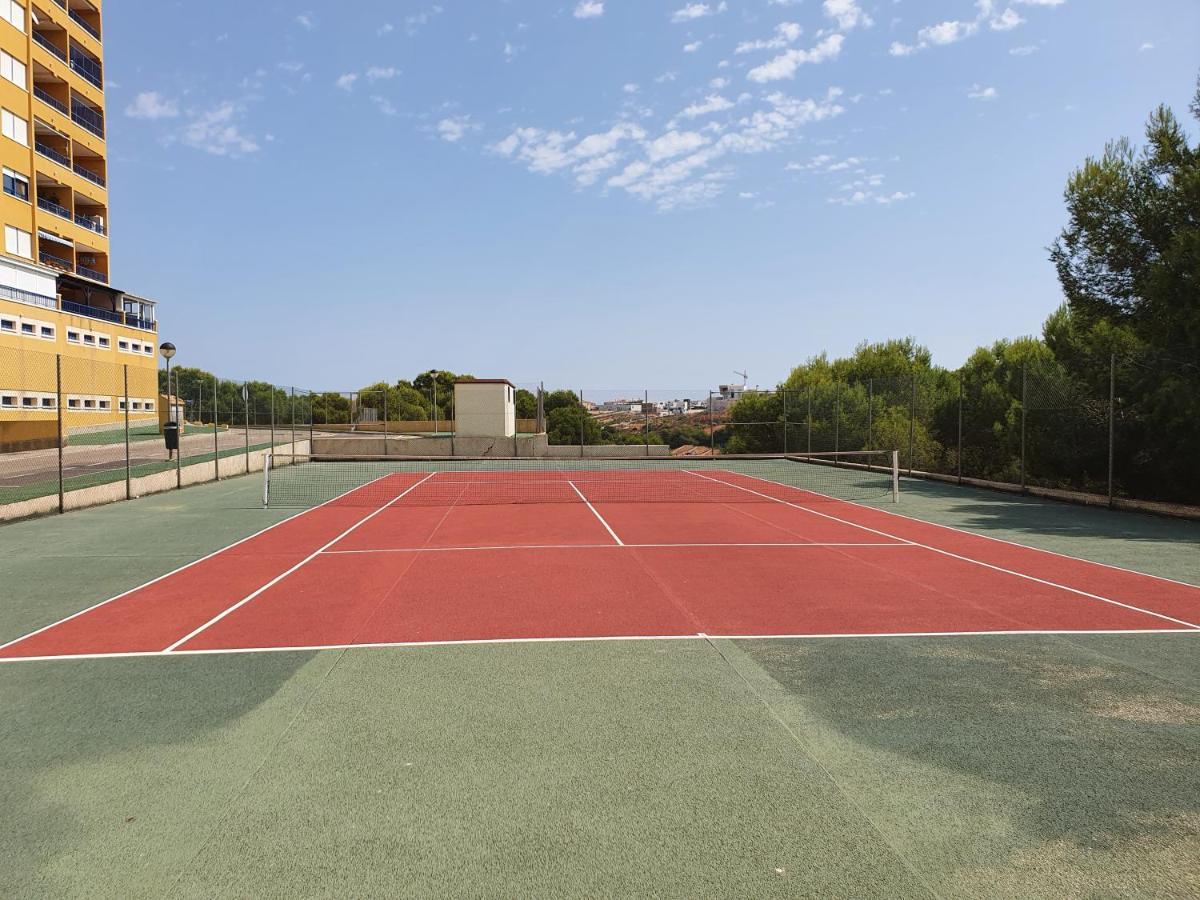 Apartment In Campoamor Overlooking The Swimming Pool מראה חיצוני תמונה